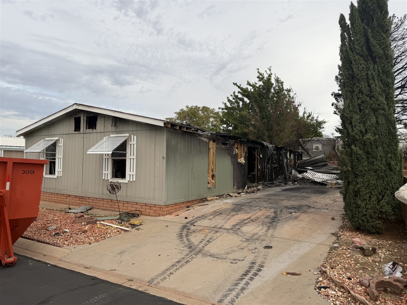 Burn-damaged structure before demolition cleanup